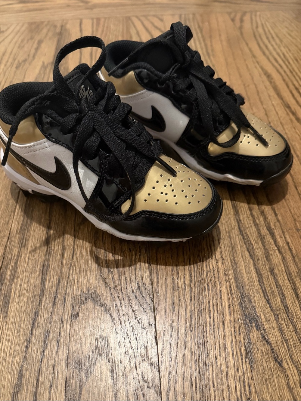 Jordan Kids' Black White and Gold Low-Top Cleats Sneakers